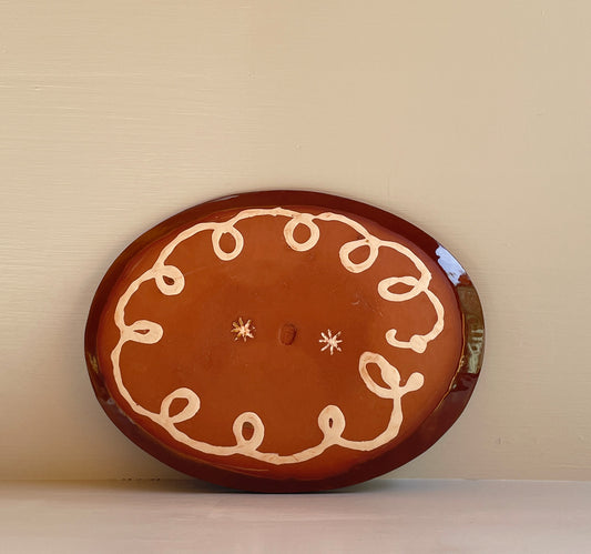 Brown and yellow slipware, feathercomb oval dish, A