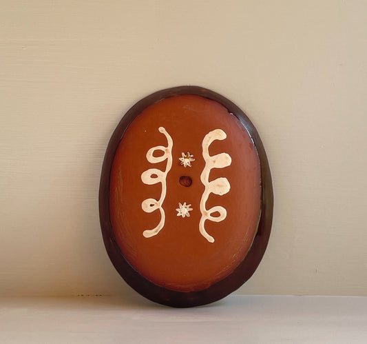 Brown and yellow slipware, feathercomb loops oval dish