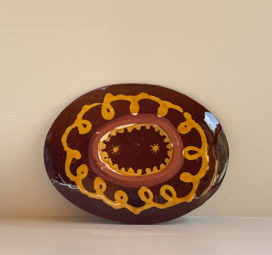 Brown and yellow slipware, bird oval dish, B